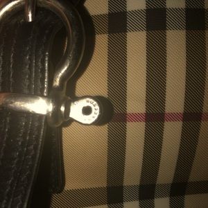 Burberry hand bag with a wrist bag